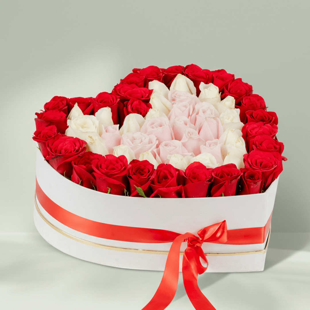 Mixed Roses Heart Box arranged with red, pink and white mixed roses