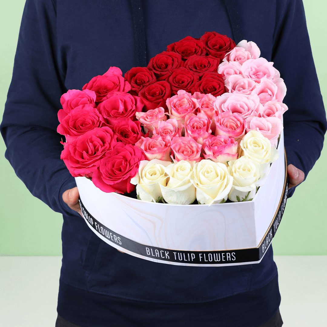 Cupid’s Mixed Rose Heart Box arranged with red, pink and white roses