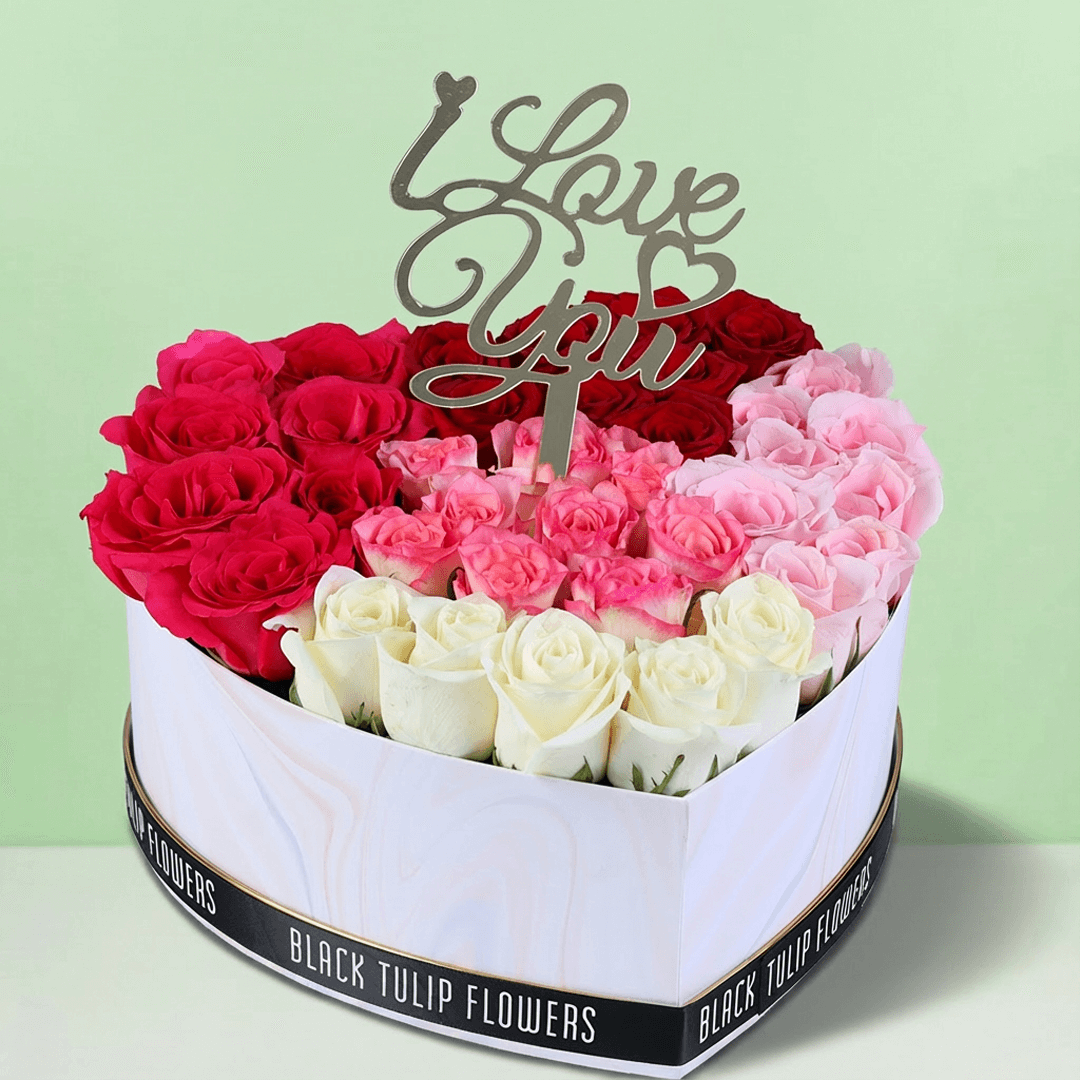 Cupid’s Mixed Rose Heart Box arranged with red, pink and white roses
