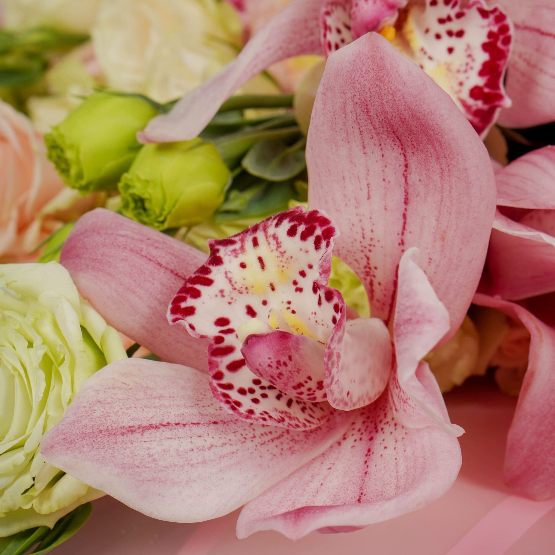Luxury mixed flower bouquet with cymbidium, hydrangea, roses and Korean wrapping