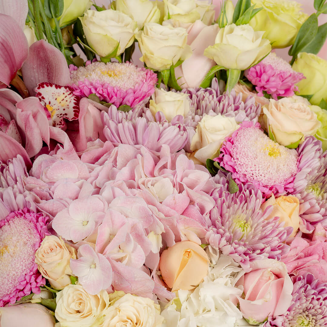 Luxury mixed flower bouquet with cymbidium, hydrangea, roses and Korean wrapping