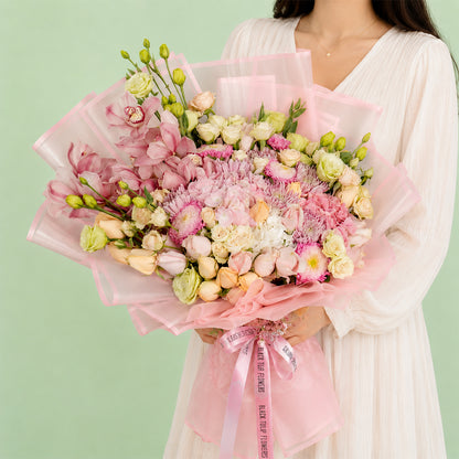 Luxury mixed flower bouquet with cymbidium, hydrangea, roses and Korean wrapping