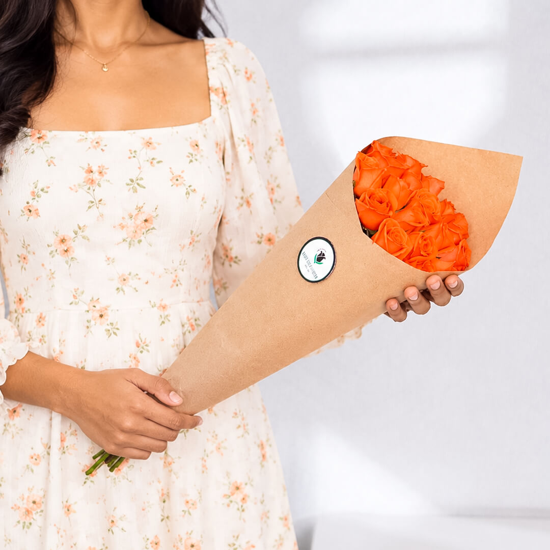 Premium cut sunflowers wrapped in a protective sleeve for fresh flower arrangements.