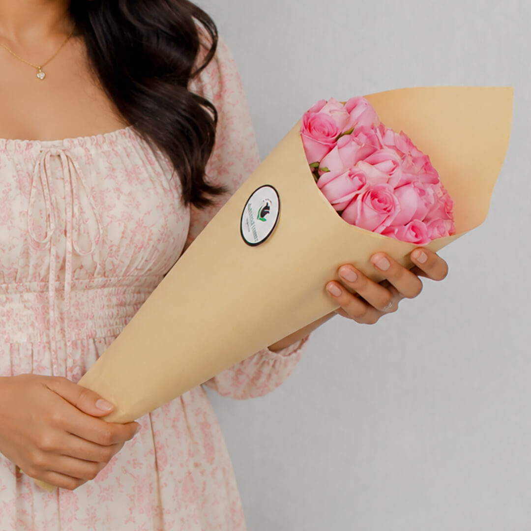 Premium cut sunflowers wrapped in a protective sleeve for fresh flower arrangements.