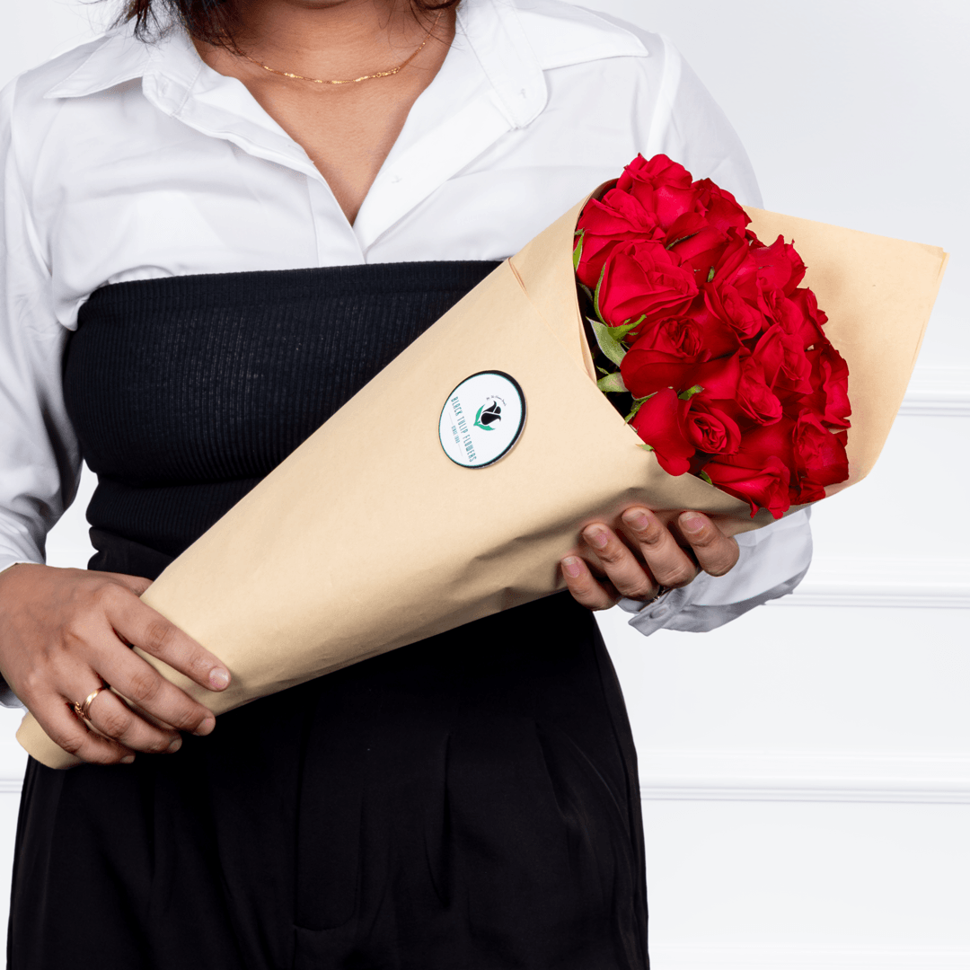 Premium cut sunflowers wrapped in a protective sleeve for fresh flower arrangements.