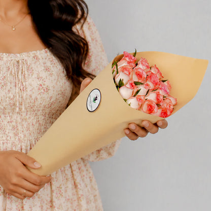 Premium cut sunflowers wrapped in a protective sleeve for fresh flower arrangements.