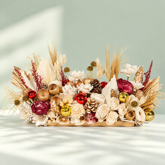 Frosty Finesse dried flower table runner featuring 60 to 70 assorted natural dried blooms for Christmas decorations.