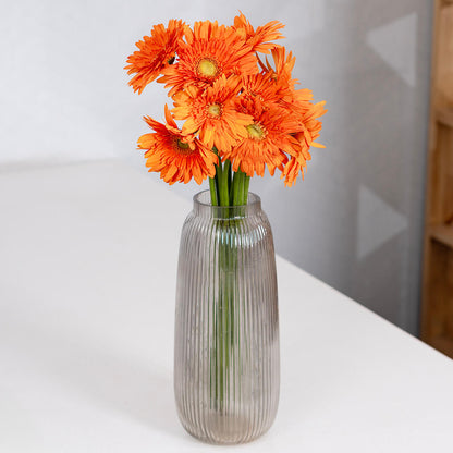 Gerbera cut flowers with open blooms in multiple bright colours