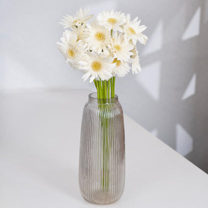 Gerbera cut flowers with open blooms in multiple bright colours