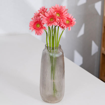 Gerbera cut flowers with open blooms in multiple bright colours