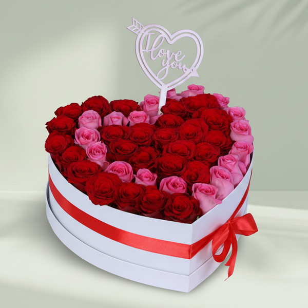 Love Bloom Rose Heart Box arranged with red and pink roses