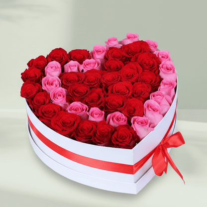 Love Bloom Rose Heart Box arranged with red and pink roses