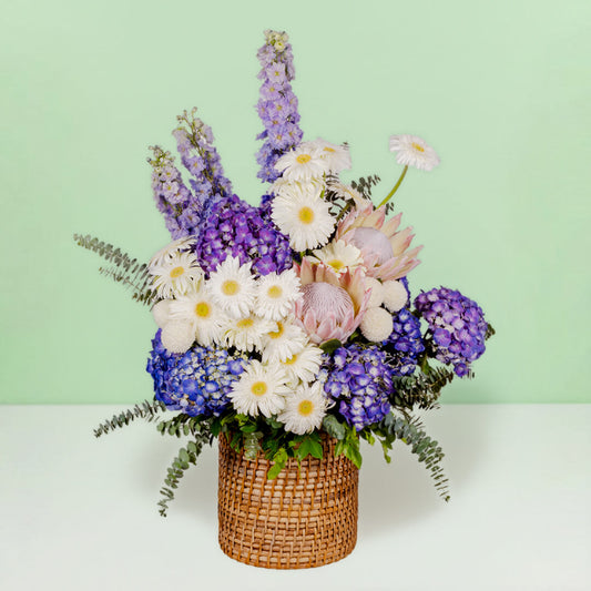 Luxury assorted flower basket with protea, hydrangea, gerberas and eucalyptus