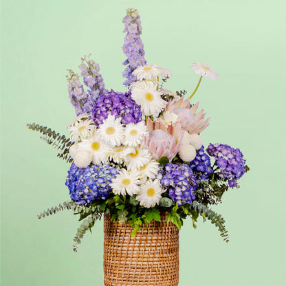 Luxury assorted flower basket with protea, hydrangea, gerberas and eucalyptus