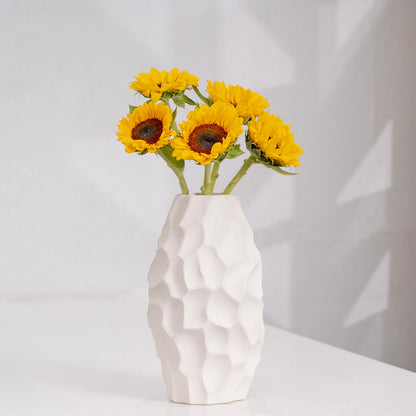 Premium cut sunflowers wrapped in a protective sleeve for fresh flower arrangements.