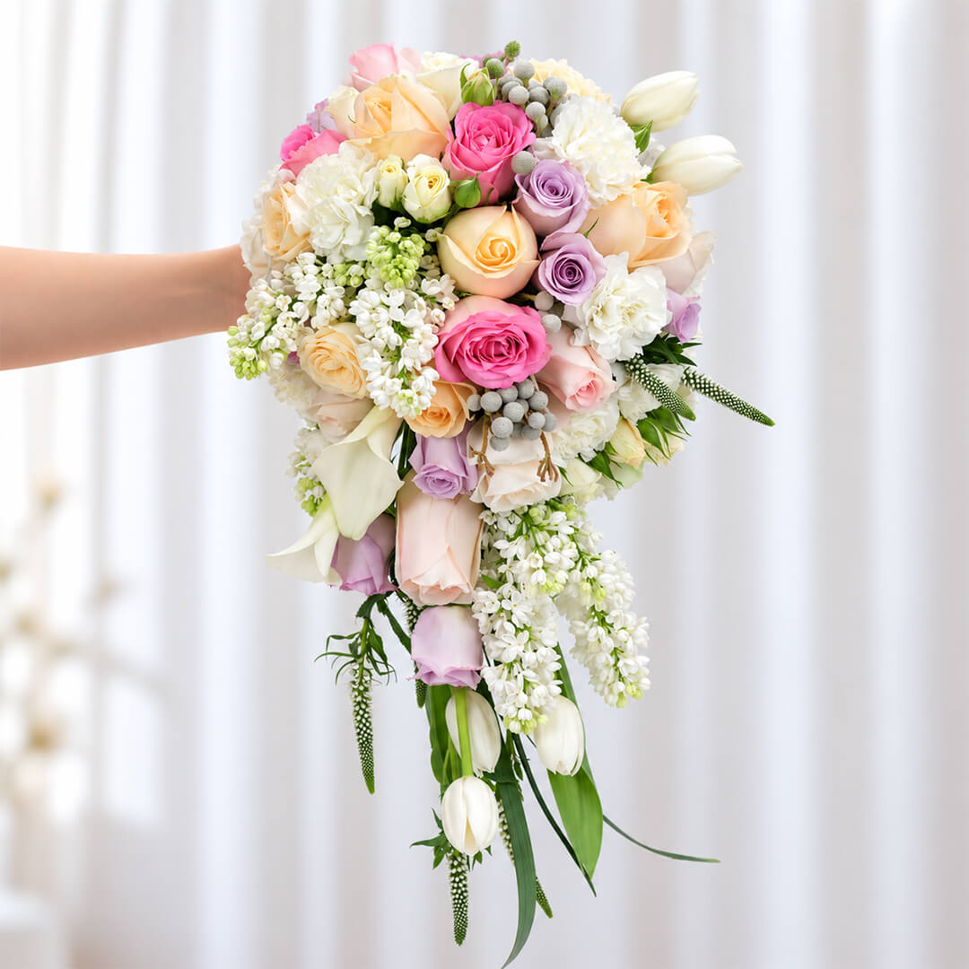 40-stem bridal bouquet featuring tulips, roses, Calla lilies, and assorted premium flowers