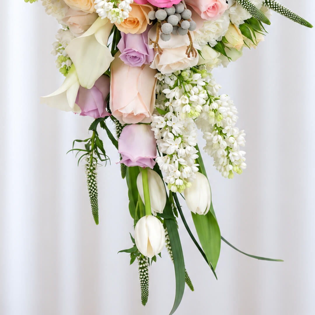 40-stem bridal bouquet featuring tulips, roses, Calla lilies, and assorted premium flowers