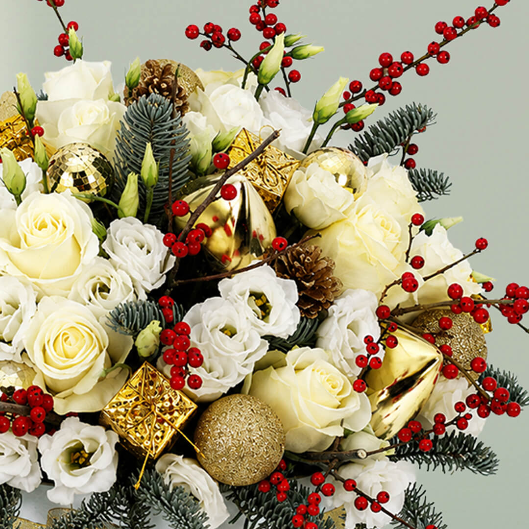 Merry Christmas Gift Box with 50 assorted fresh flowers arranged beautifully in a round box
