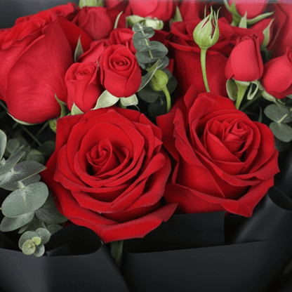10 Red Love Rose Mini Bouquet arranged with 10 red roses, spray roses and eucalyptus