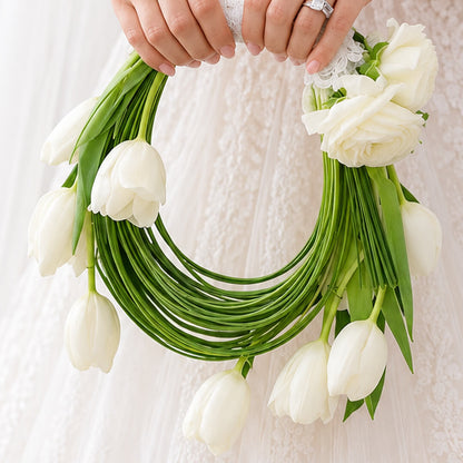 White tulip and steel grass modern floral arrangement for décor and gifting