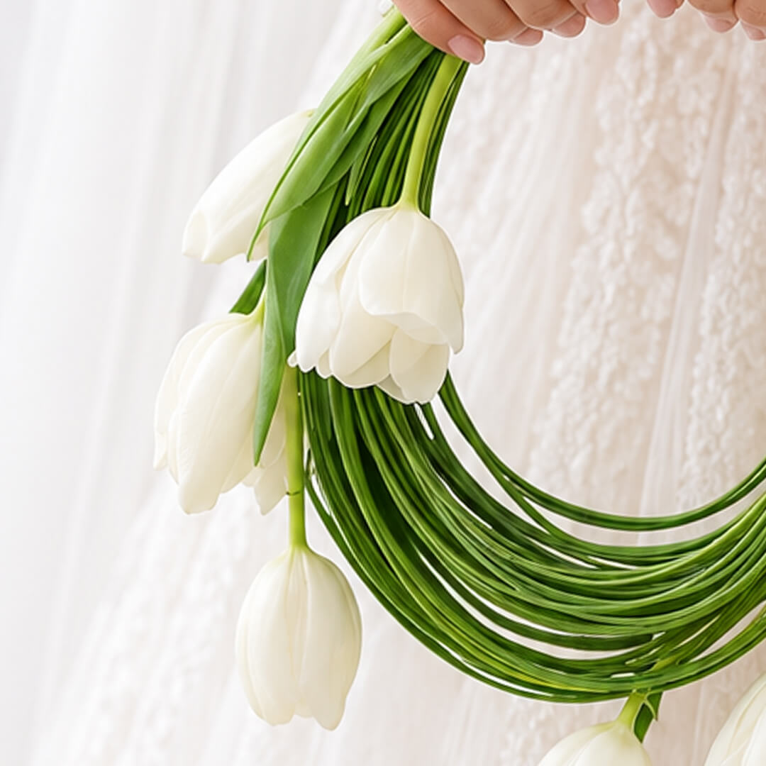 White tulip and steel grass modern floral arrangement for décor and gifting