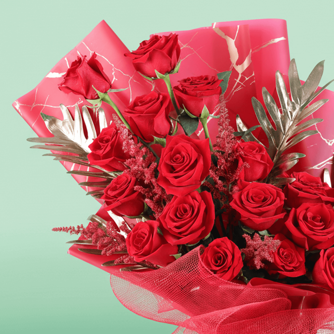 Crimson Passion Red Floral Bouquet arranged with red roses with lush greenery and seasonal red accents