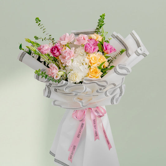 Pastel Dreams bouquet featuring soft pastel flowers arranged beautifully for elegant gifting and special occasions