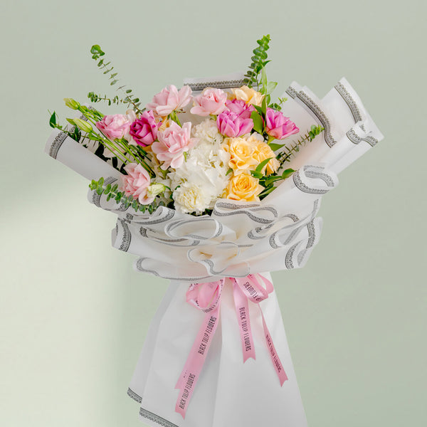 Pastel Dreams bouquet featuring soft pastel flowers arranged beautifully for elegant gifting and special occasions