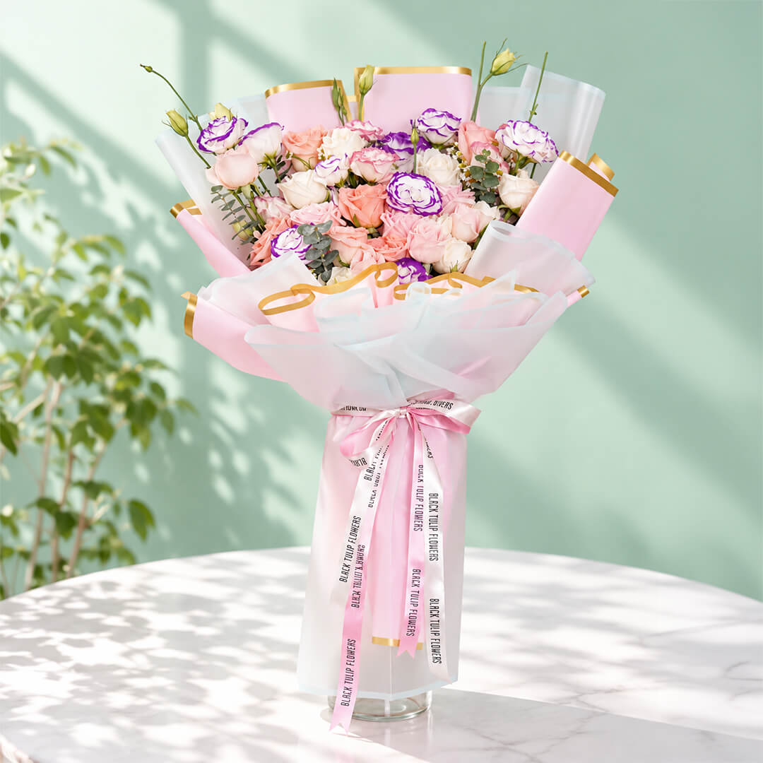 Pink and purple rose and eustoma bouquet with eucalyptus in Korean-style flower wrapping