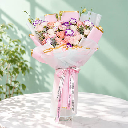 Pink and purple rose and eustoma bouquet with eucalyptus in Korean-style flower wrapping