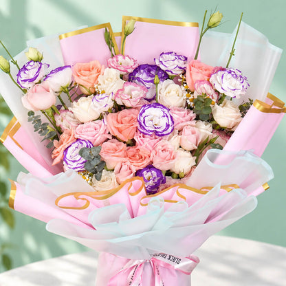 Pink and purple rose and eustoma bouquet with eucalyptus in Korean-style flower wrapping
