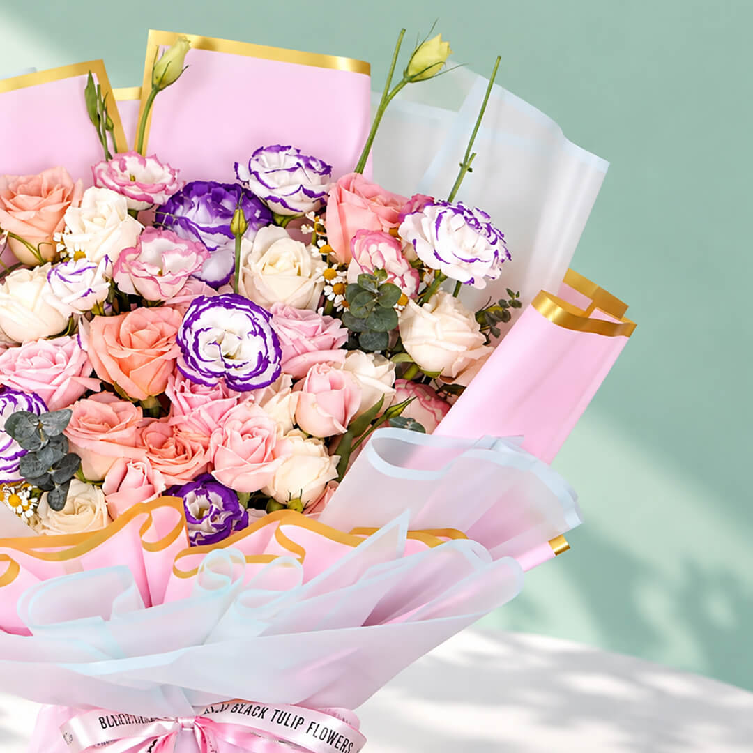Pink and purple rose and eustoma bouquet with eucalyptus in Korean-style flower wrapping