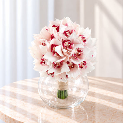 Hand-tied bridal bouquet of 5 pink Cymbidium orchids with elegant wrapping