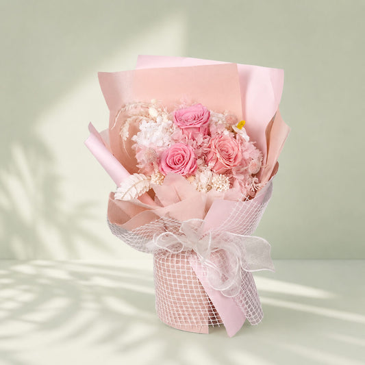 Pink Perfection preserved flower bouquet featuring delicate pink blooms for elegant, long-lasting gifting.