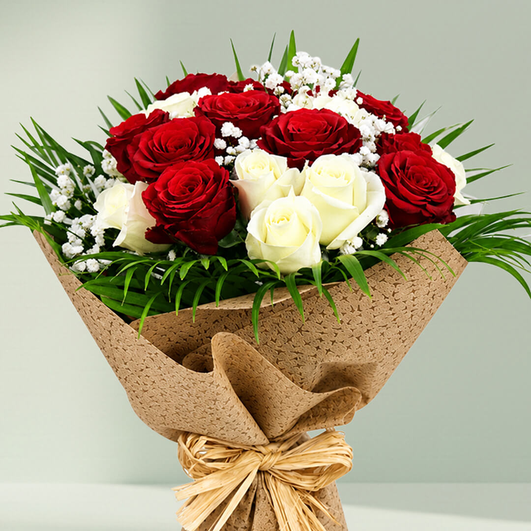 Beautiful 20 red and white roses bouquet wrapped in natural jute for special occasions