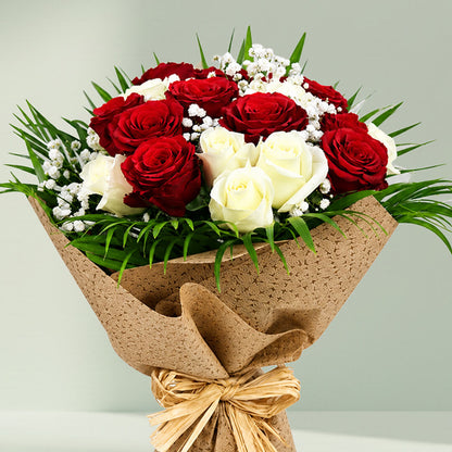 Beautiful 20 red and white roses bouquet wrapped in natural jute for special occasions