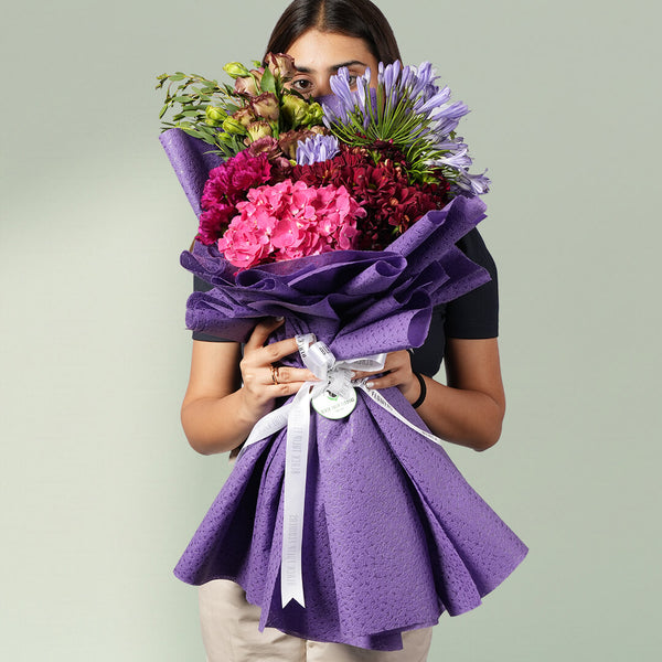 Purple Garden Elegance bouquet with hydrangeas, chrysanthemums, carnations, eustoma and eucalyptus