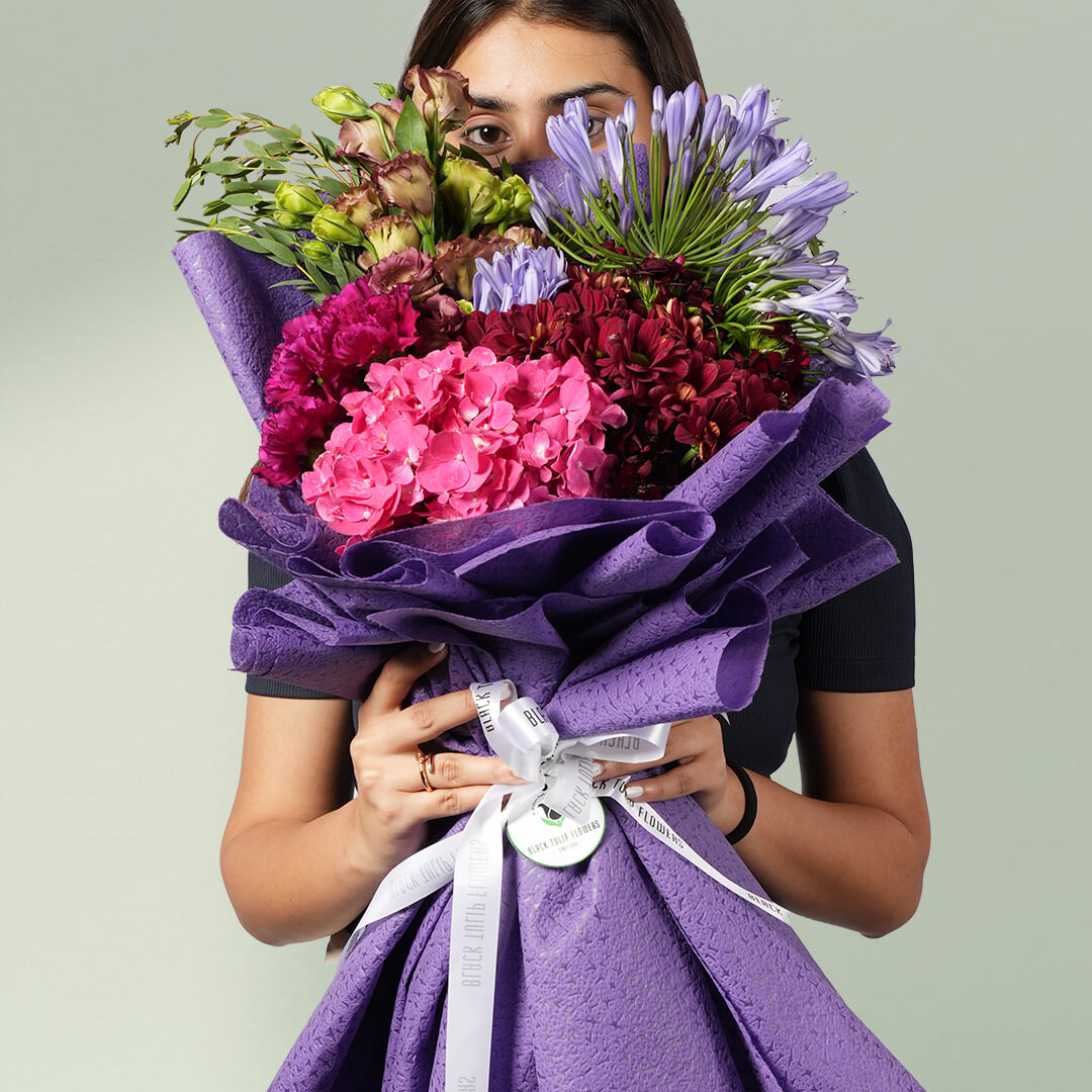 Purple Garden Elegance bouquet with hydrangeas, chrysanthemums, carnations, eustoma and eucalyptus