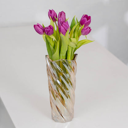 Deep purple cut tulip flowers featuring rich velvet petals and long green stems