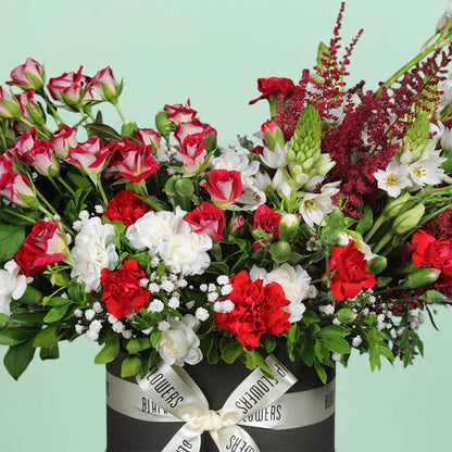 Radiant red flower bouquet with fresh roses arranged beautifully for gifting and special occasions