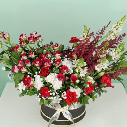 Radiant red flower bouquet with fresh roses arranged beautifully for gifting and special occasions