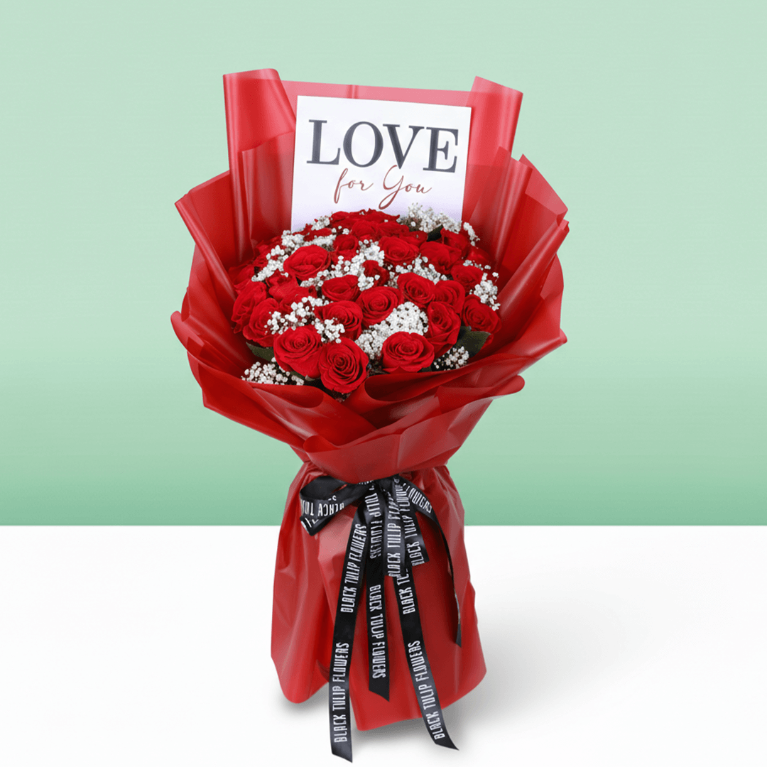 Passionate Red Whisper Bouquet arranged with 35 red roses with delicate gypso
