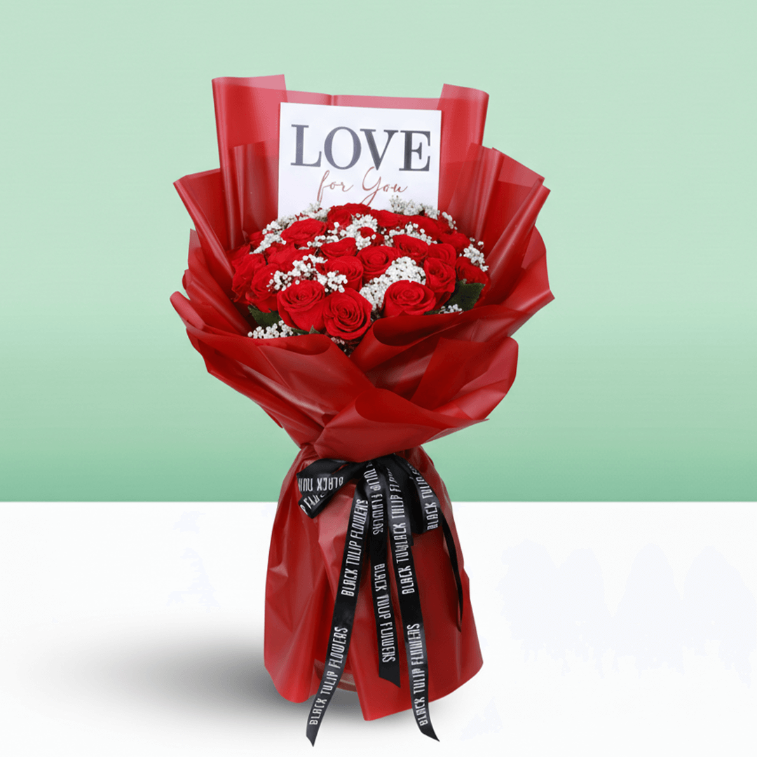 Passionate Red Whisper Bouquet arranged with 35 red roses with delicate gypso