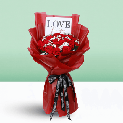 Passionate Red Whisper Bouquet arranged with 35 red roses with delicate gypso