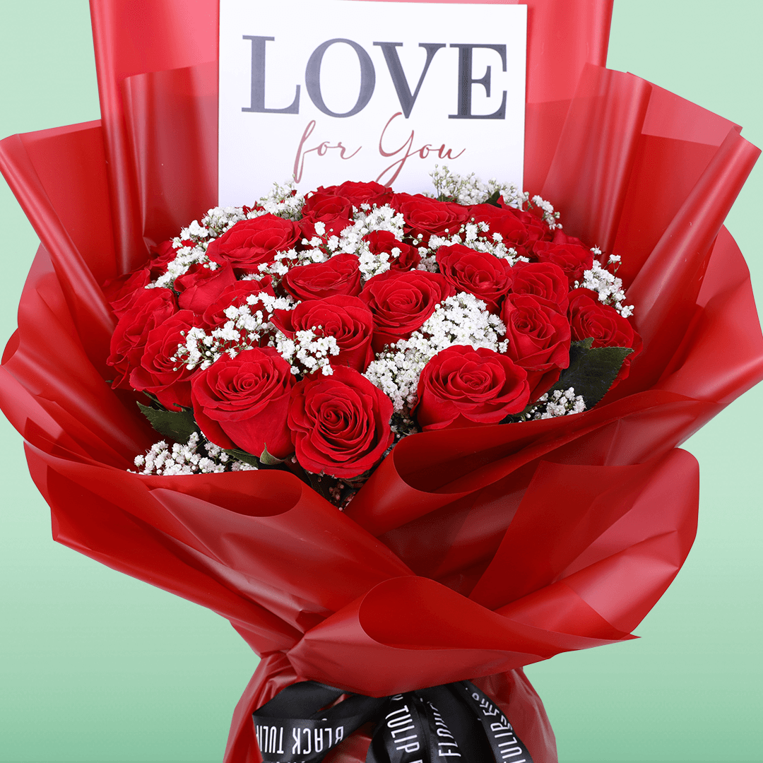 Passionate Red Whisper Bouquet arranged with 35 red roses with delicate gypso