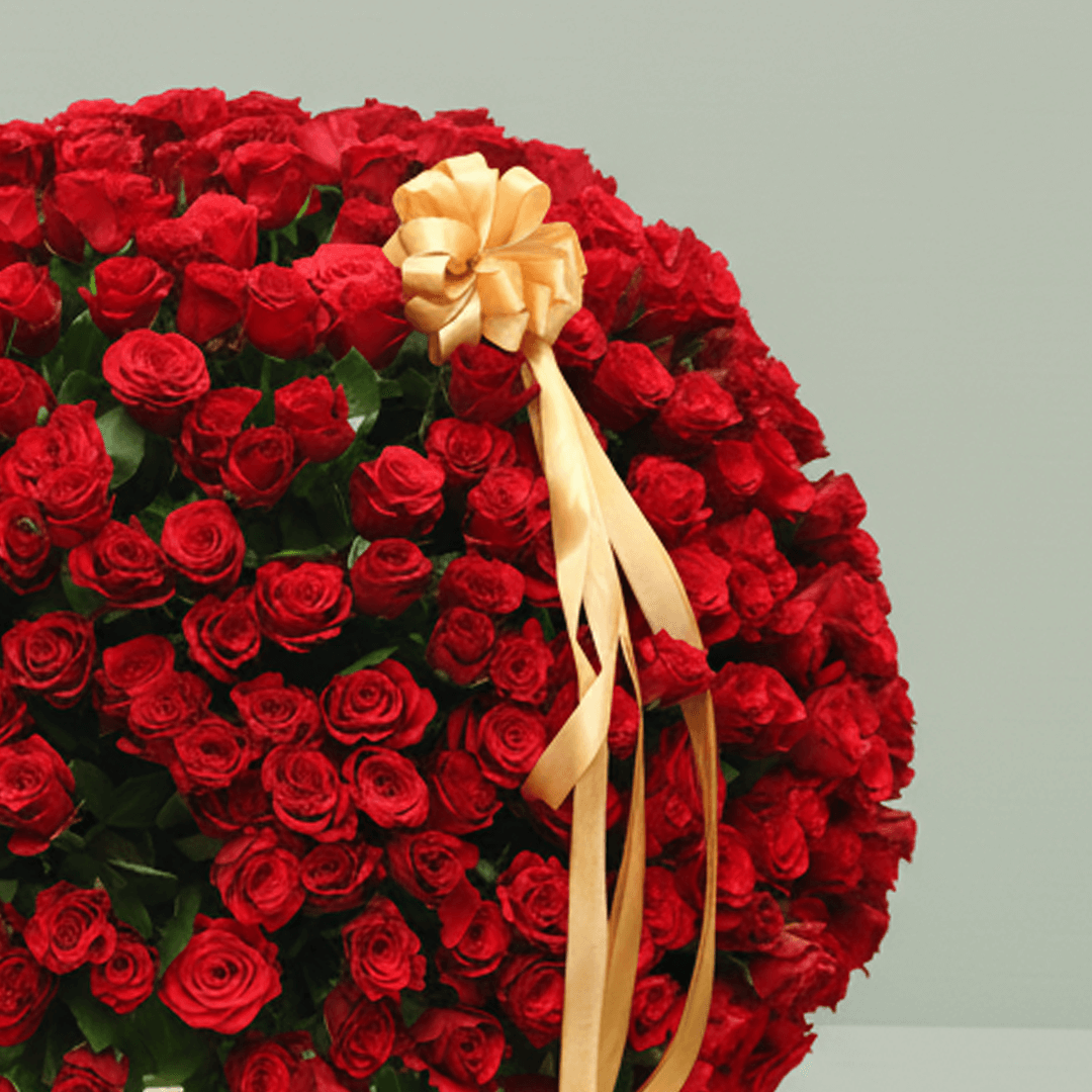 250 Red Roses Basket Arrangement arranged with 250 red roses with a luxe gold ribbon