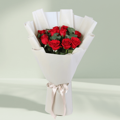 Red Roses Bouquet in White Wrap arranged with red roses with fresh greenery