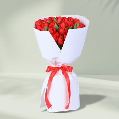 Red Tulip Passion Bouquet arranged with 30 red tulips with premium white wrapping.