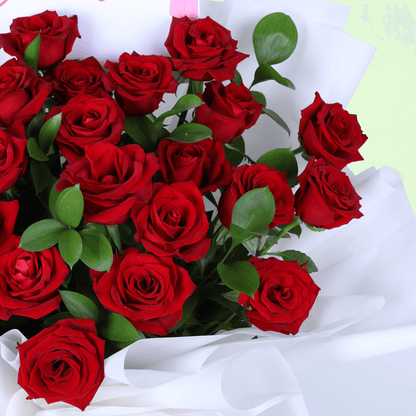 Romantic Red Rose Gift Bouquet arranged with red roses in white wrap with a Miss You topper