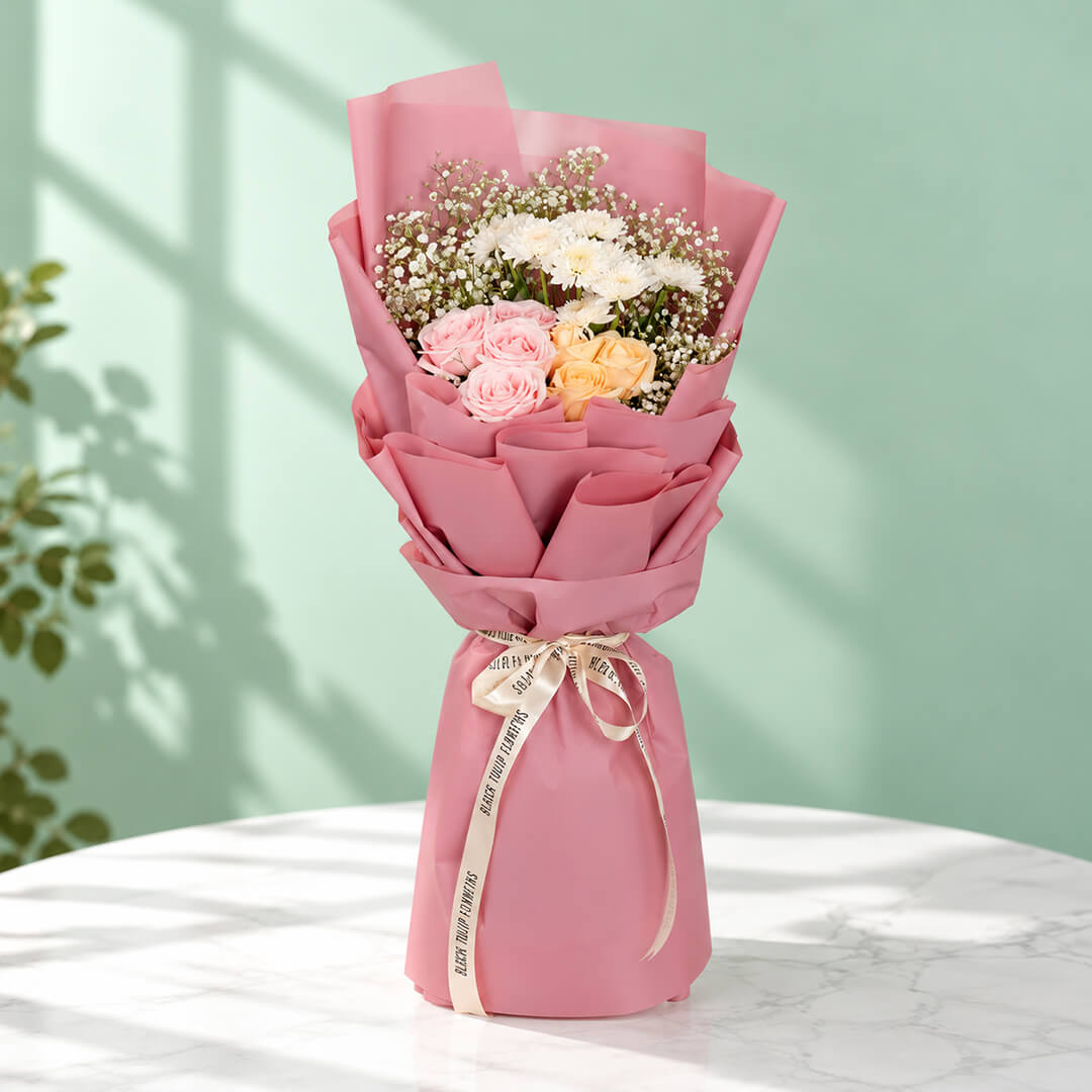 12-stem mixed flower bouquet featuring roses, chrysanthemums, and gypso in assorted colours, wrapped in Korean-style flower wrapping sheets.